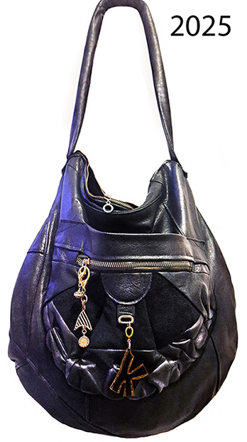 Usnjena torba z veliko žepi in kaveljčki za obeske